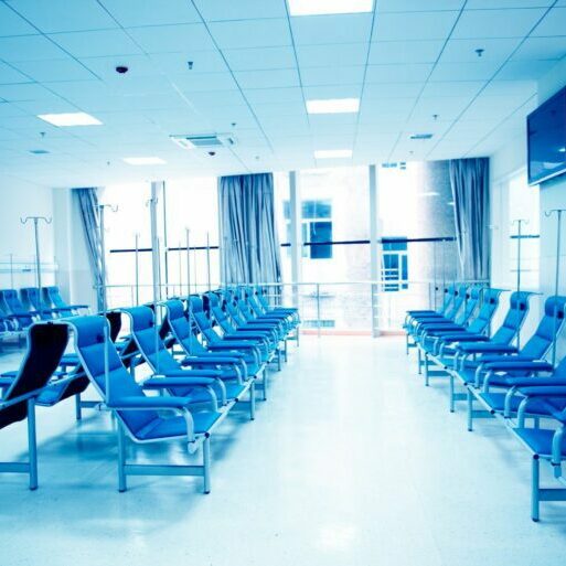 17828538 - row of chairs in a infusion room of hospital.